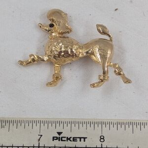 Vintage Prancing poodle brooch dog pin Black Eye gold tone figural